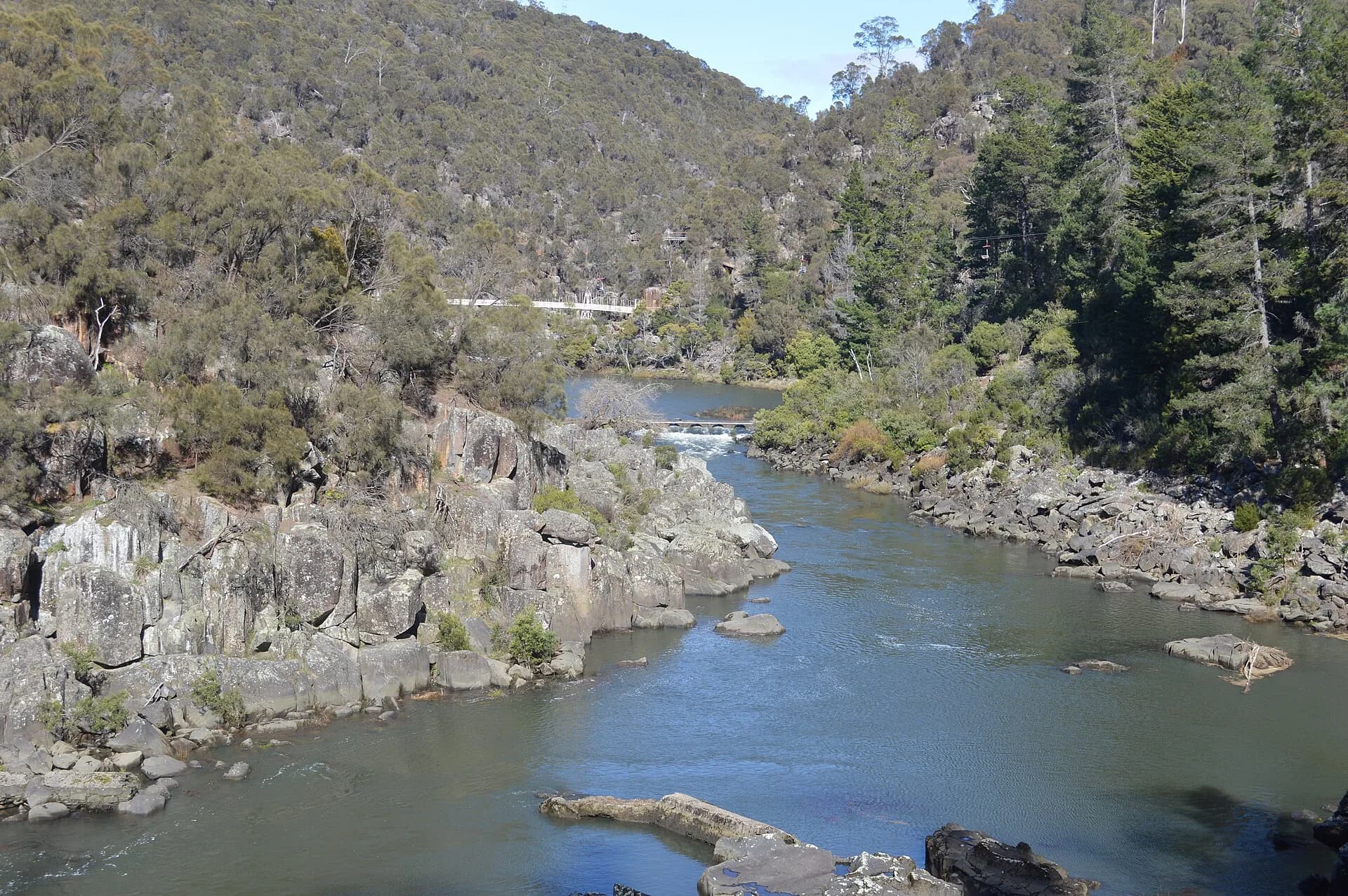 Suspension bridge and wooded gorge at First Basin