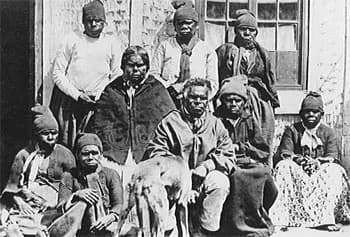Historic group portrait of Tasmanian Aboriginal people associated with Oyster Cove