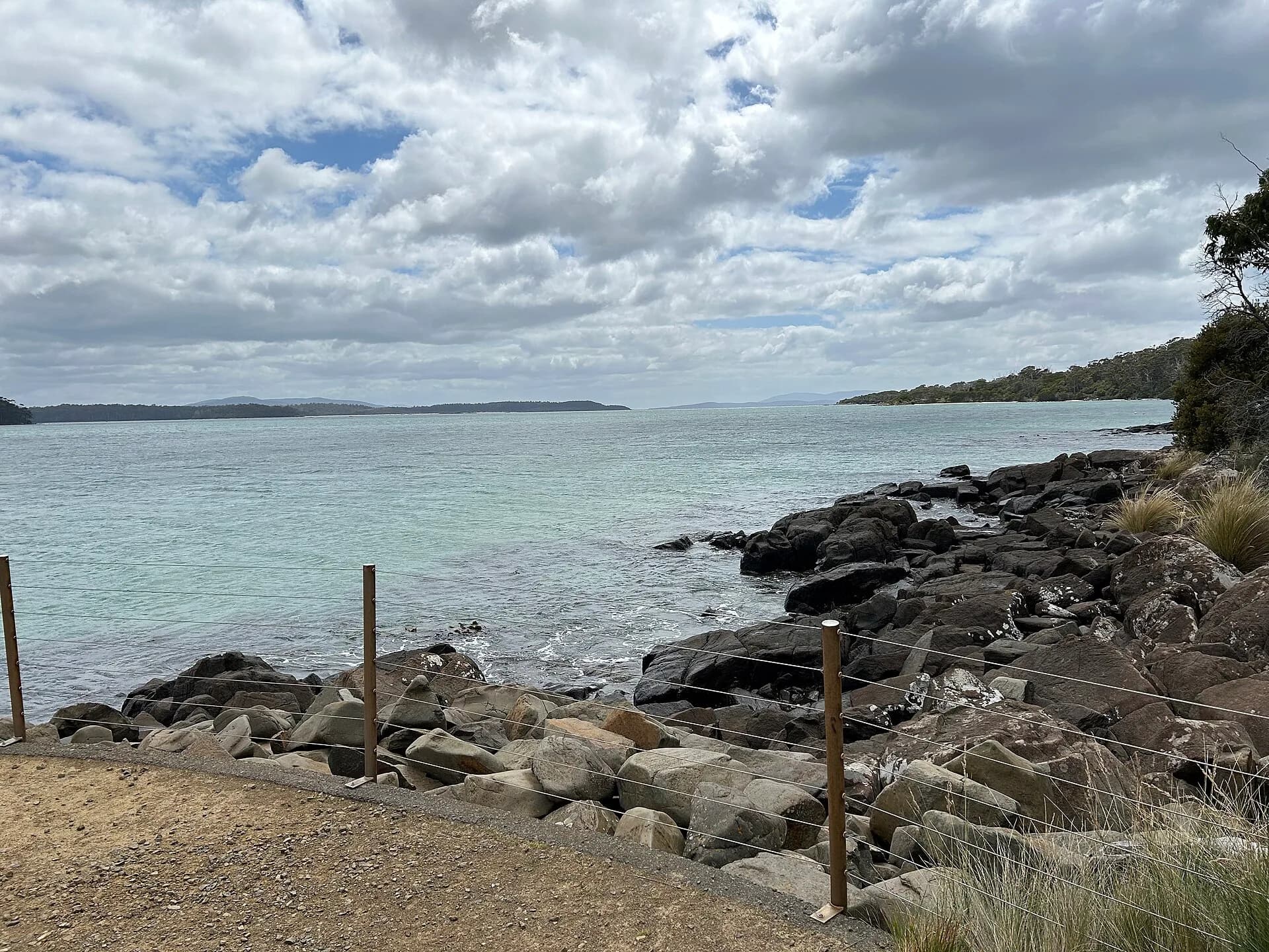 Calm water and forested shore at Recherche Bay