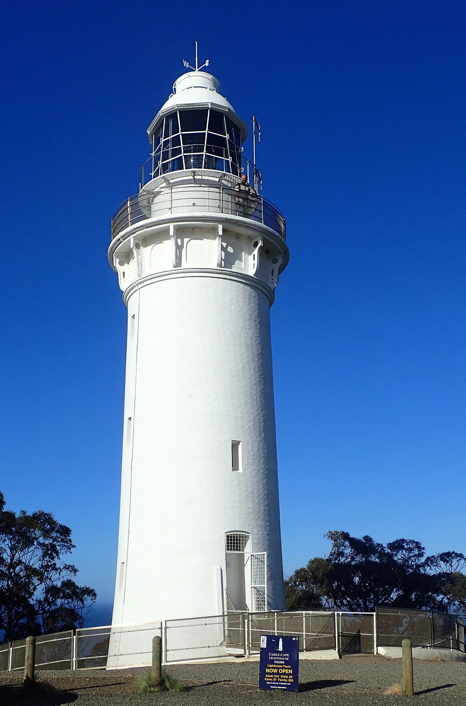 Brick Table Cape lighthouse beneath a cloudy sky