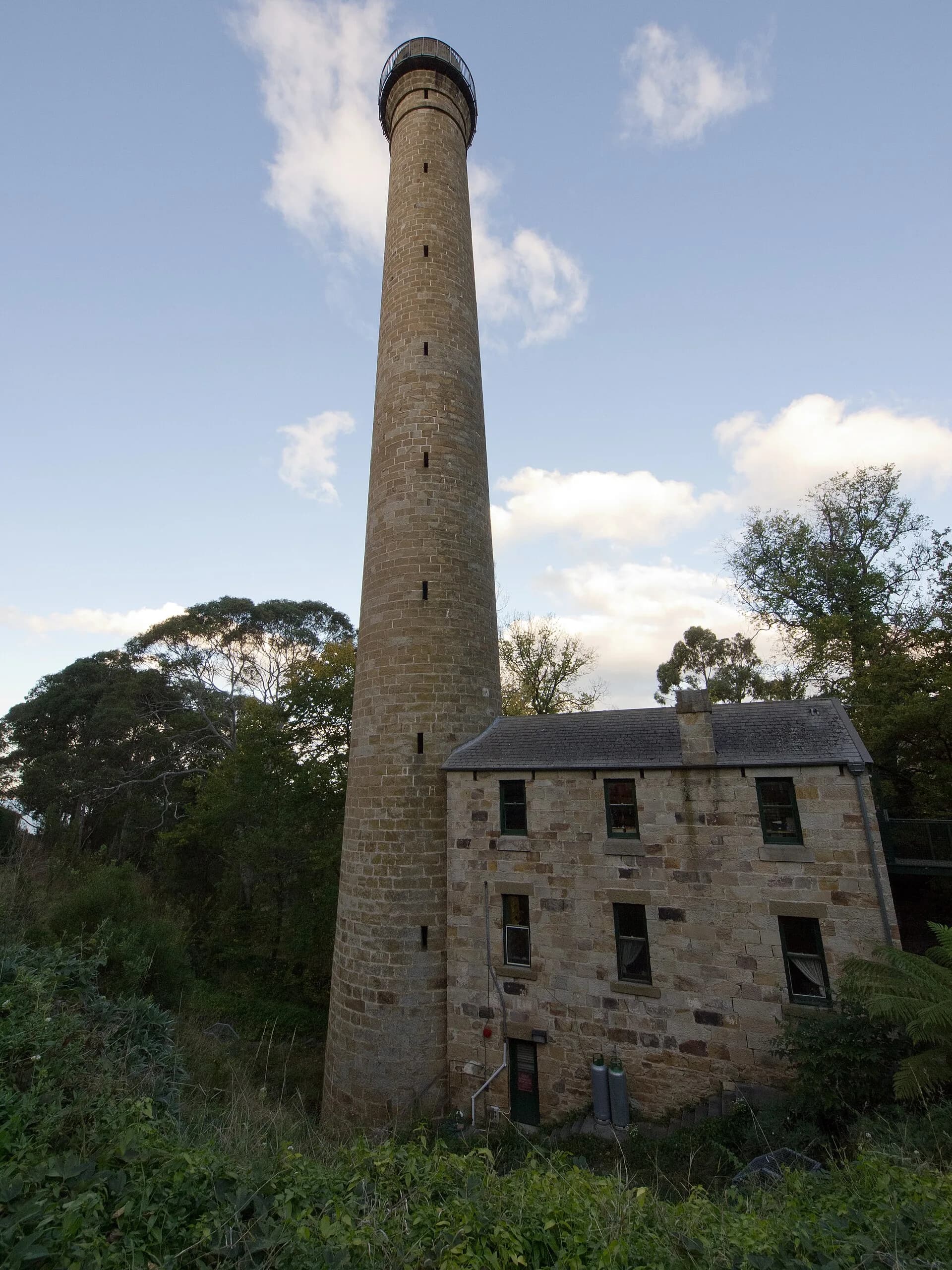 Tall circular sandstone Shot Tower at Taroona